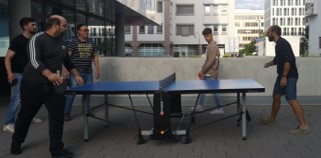people playing ping pong